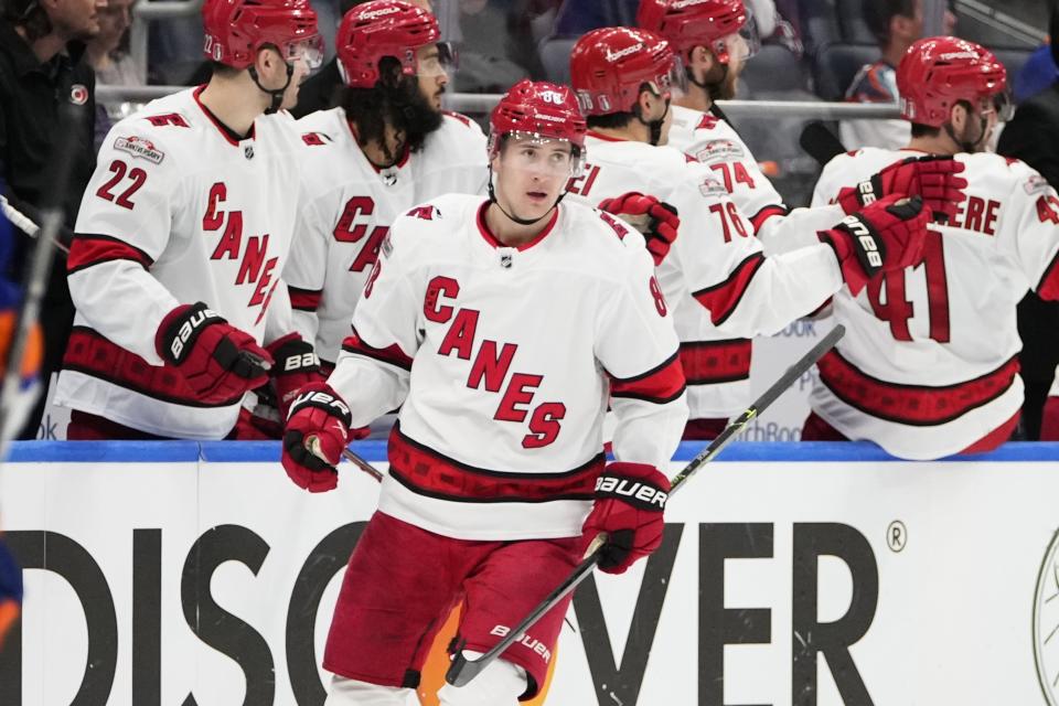 Carolina Hurricanes' Martin Necas (88) celebrates with teammates after scoring a goal during the second period of Game 4 of an NHL hockey Stanley Cup first-round playoff series against the New York Islanders, Sunday, April 23, 2023, in Elmont, N.Y. (AP Photo/Frank Franklin II)