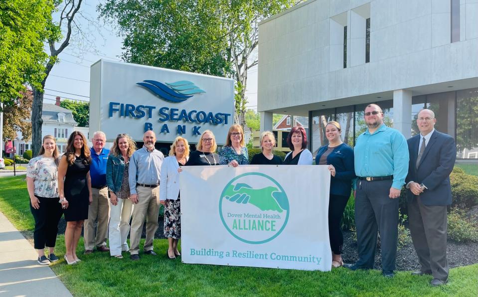 From left to right are Sarah Frase, Melissa Lesniak, Gregg Dowty, Suzanne Weete, Kevin Foley, Sharon Zacharias, Cherie Boudreau, Sharla Rollins, Katie Buote, Tammie Cilley, Amanda Gagne, Steven Sprague, Jim Brannen.