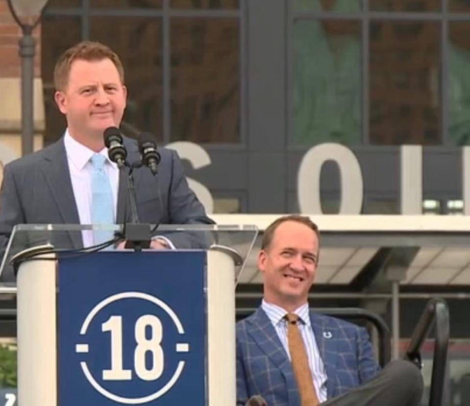 Peyton Manning laughs at Fox 59's Chris Hagan as he emcees the ceremony unveiling Manning's statue outside of Lucas Oil Stadium in 2017.