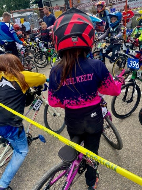Ariel Kelly, 9, who loves BMX racing and trains with her great-grandfather, Lowell Ruda.