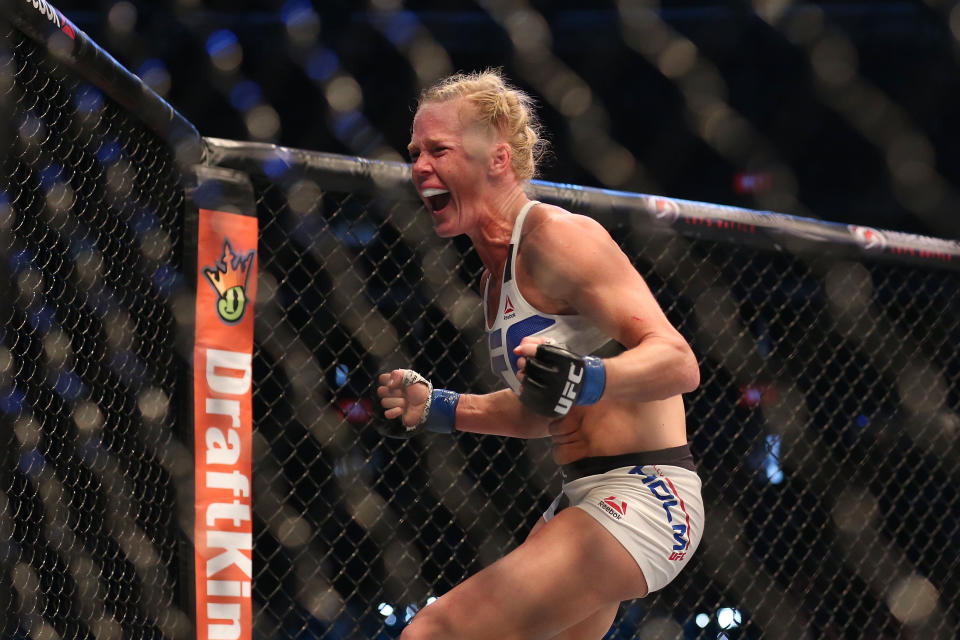 MELBOURNE, AUSTRALIA - NOVEMBER 15:  Holly Holm of the United States celebrates victory over Ronda Rousey of the United States in their UFC women's bantamweight championship bout during the UFC 193 event at Etihad Stadium on November 15, 2015 in Melbourne, Australia.  (Photo by Quinn Rooney/Getty Images)