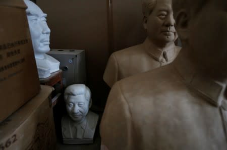 The Wider Image: Busts of leaders a hit in China's porcelain capital