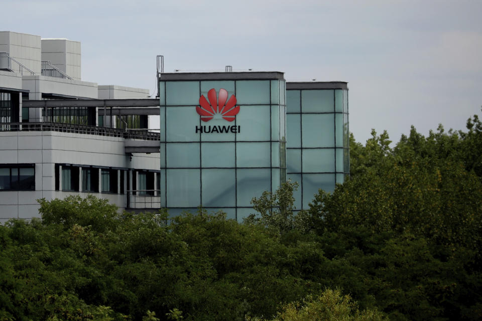 A Huawei sign is displayed on their premises in Reading, England, Tuesday, July 14, 2020. Britain's government on Tuesday backtracked on plans to give Chinese telecommunications company Huawei a limited role in the U.K.'s new high-speed mobile phone network in a decision with broad implications for relations between London and Beijing. (AP Photo/Matt Dunham)