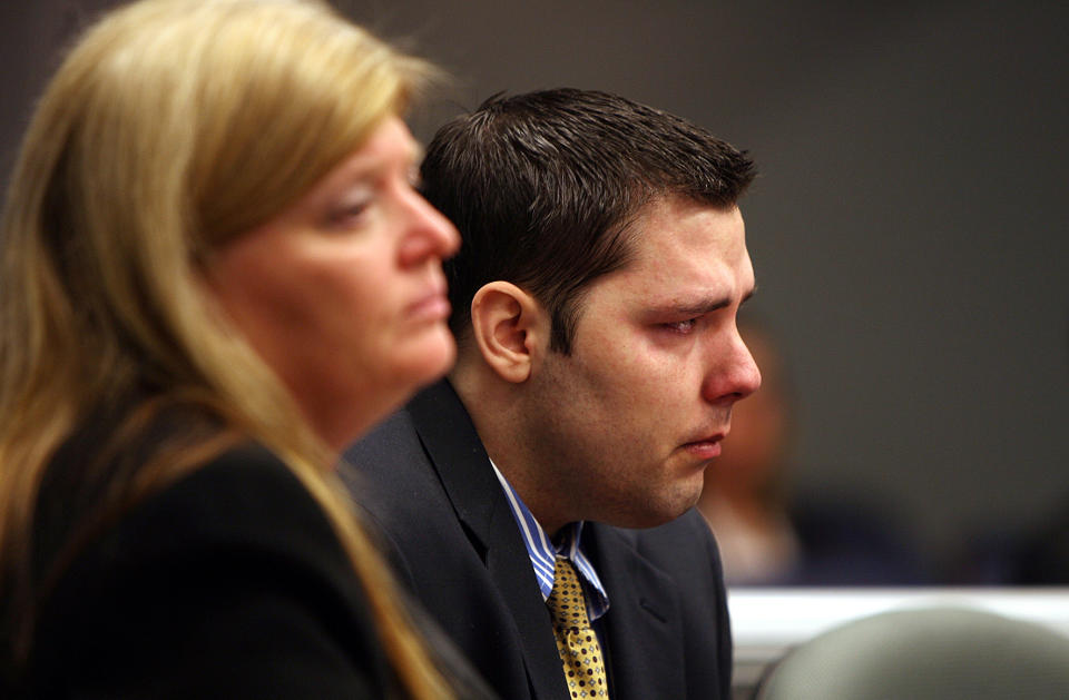 Army Sgt. Anthony Peden listens to a Long County court, Thursday, May 1, 2014, in Ludowici, Ga. Peden was sentenced to life in prison Thursday by a southeast Georgia judge for the December 2011 slayings of 17-year-old Tiffany York and her boyfriend, former soldier Michael Roark. (AP Photo/Lewis Levine)