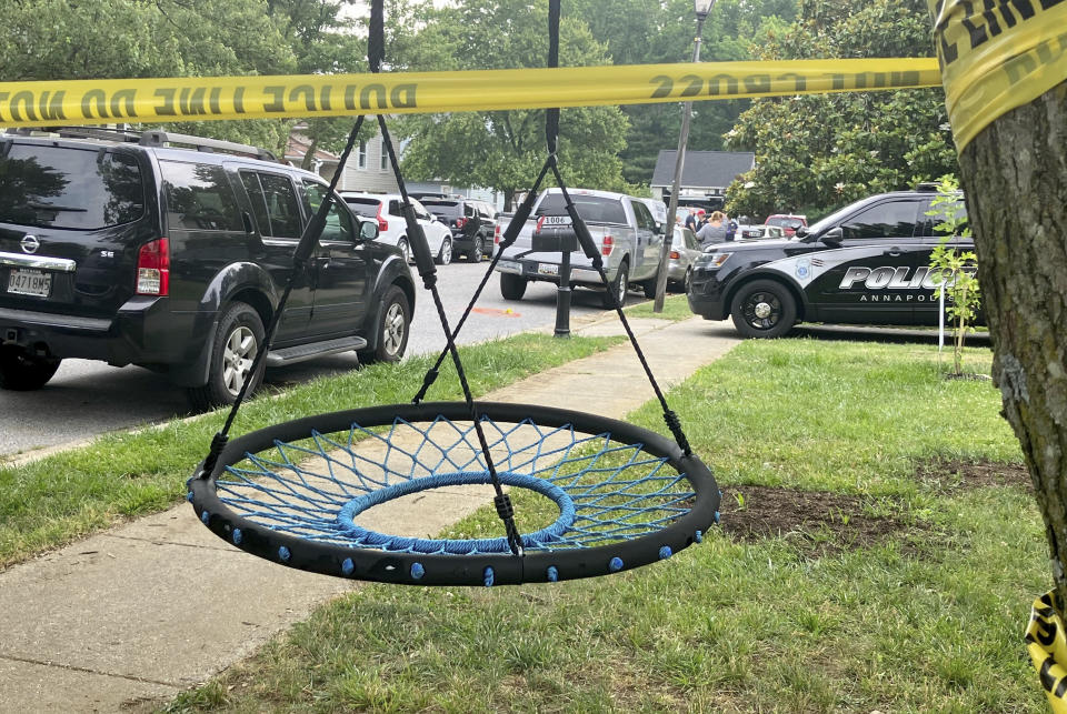 The FBI and other law enforcement agencies, investigate the scene Monday, June 12, 2023 where six people were shot, three fatally, at a home in Annapolis, Md. Sunday evening. (Luke Parker/The Baltimore Sun via AP)