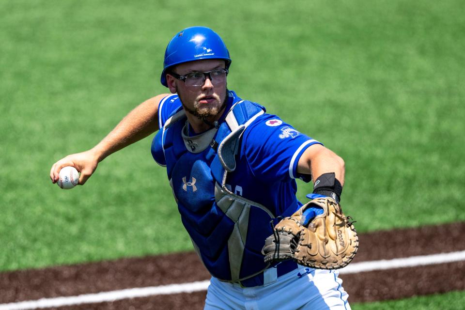 Indiana State catcher Grant Magill (5) makes a throw to first base during an NCAA baseball game against Wright State on Friday, June 2, 2023, in Terre Haute, Ind. (AP Photo/Doug McSchooler)