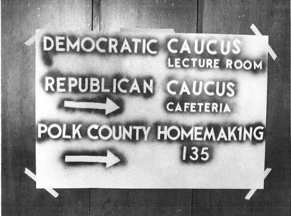 A sign gives directions to various meeting rooms at Merrill Junior High in Des Moines for the caucus on Jan. 25, 1976.