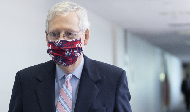 Senate Majority Leader Mitch McConnell, a Republican from Kentucky, wears a protective mask while arriving to a Senate Republican luncheon on Capitol Hill in Washington, D.C., U.S., on Tuesday, July 28, 2020. (Photo: Stefani Reynolds/Bloomberg via Getty Images)