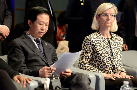 China's Finance Minister Xiao Jie (L) and Ulla Toernaes, Denmark's development aid minister, are seated prior to the start of the Development Committee Plenary, as part of the IMF and World Bank's 2017 Annual Spring Meetings, in Washington, U.S., April 22, 2017. REUTERS/Mike Theiler