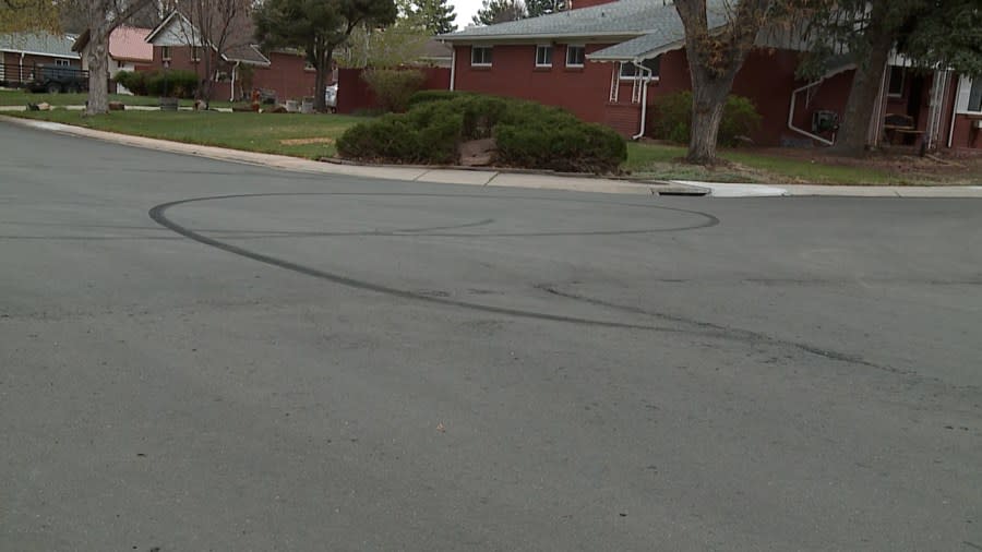 Burnout marks on a neighborhood street