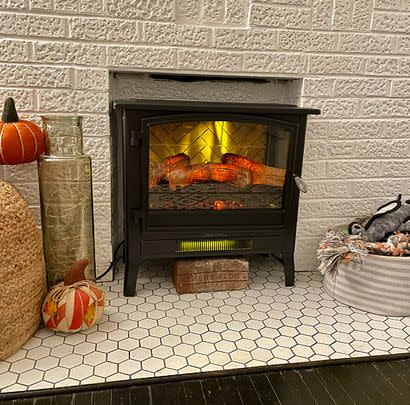 A freestanding electric fireplace stove to keep your home extra cozy