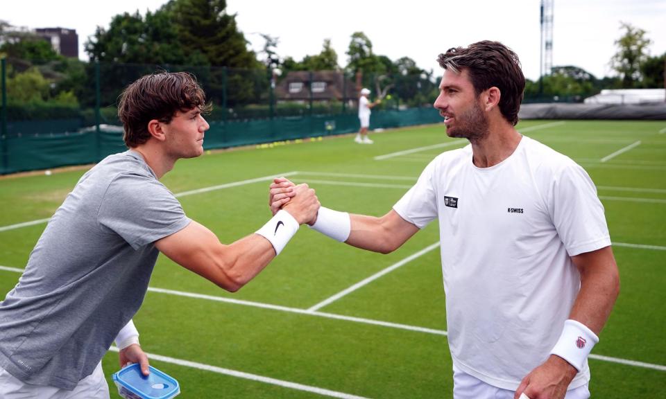 <span>Jack Draper and Cameron Norrie (right) practised together at the All England Lawn club and will now face one another in the second round.</span><span>Photograph: Zac Goodwin/PA</span>