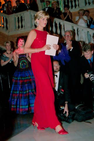 <p>AP Photo/Karin Cooper</p> Princess Diana wearing Jacques Azagury at a gala benefit to benefit victims of land mines in Washington on June 17, 1997