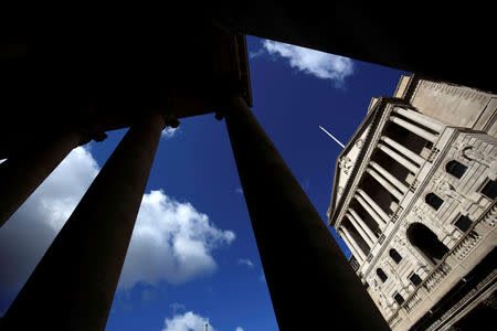 FILE PHOTO: The Bank of England is seen through the columns on the Royal Exchange building in London, Britain August 4, 2016. REUTERS/Neil Hall/File Photo