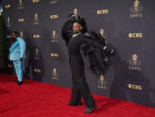 Cedric the Entertainer, left, and Billy Porter arrive at the 73rd Primetime Emmy Awards on Sunday, Sept. 19, 2021, at L.A. Live in Los Angeles. (AP Photo/Chris Pizzello)