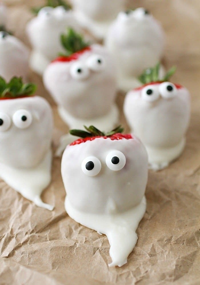 White chocolate covered strawberry "ghosts."