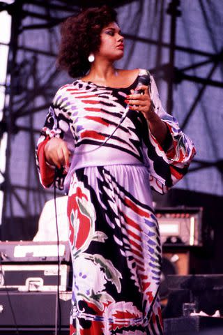 <p>Raymond Boyd/Getty</p> Angela Bofill performs during 'ChicagoFest' at Navy Pier in Chicago in August 1983