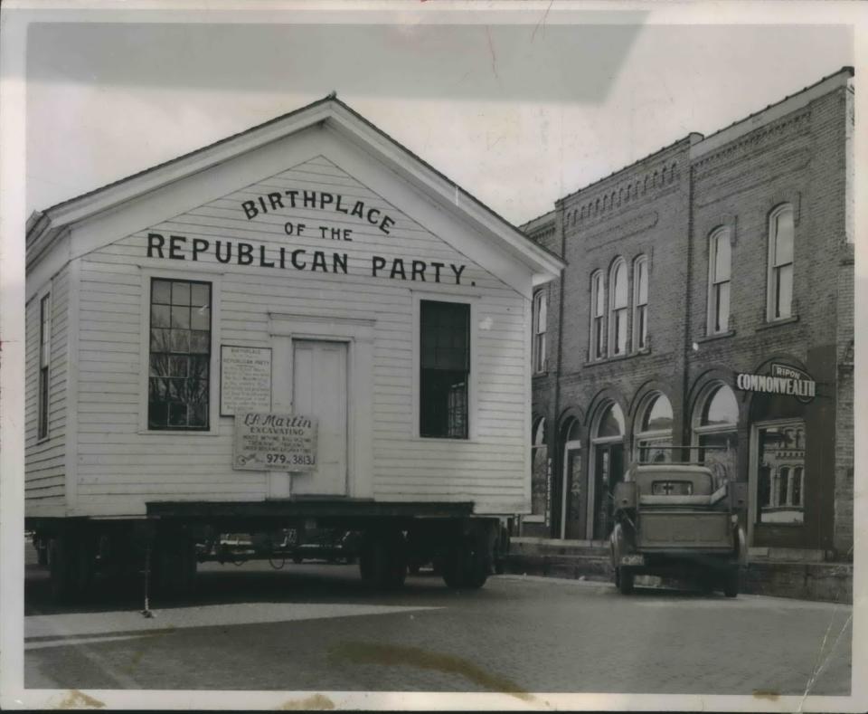 The Little White Schoolhouse, in which the Republican Party was founded in 1854, is transported from the Ripon College campus to a site on the grounds of the Republican Education Foundation in 1852. The schoolhouse would move again, for a fourth time in 2023.