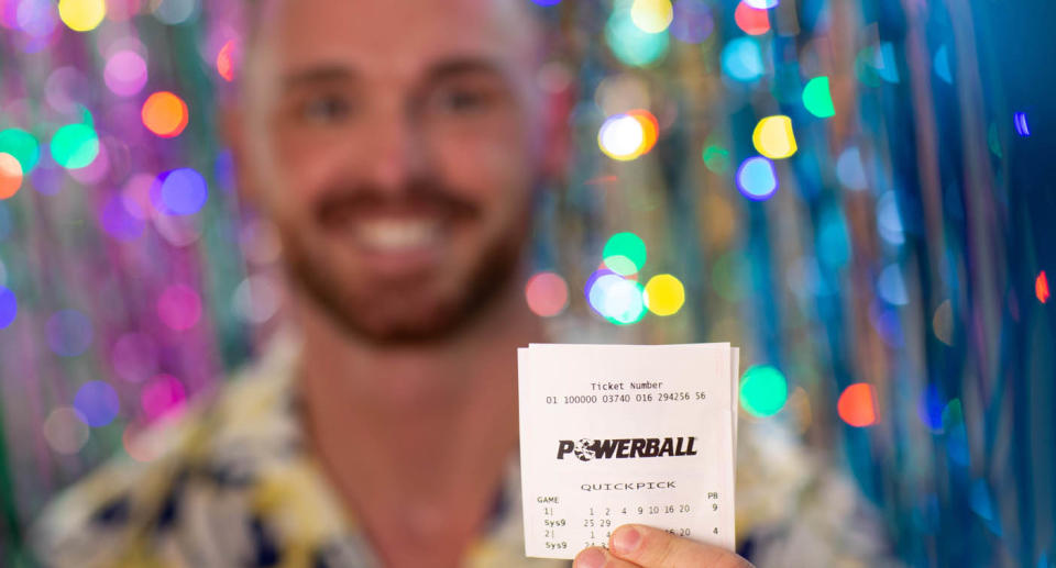 A generic photo of a man winning the Powerball.