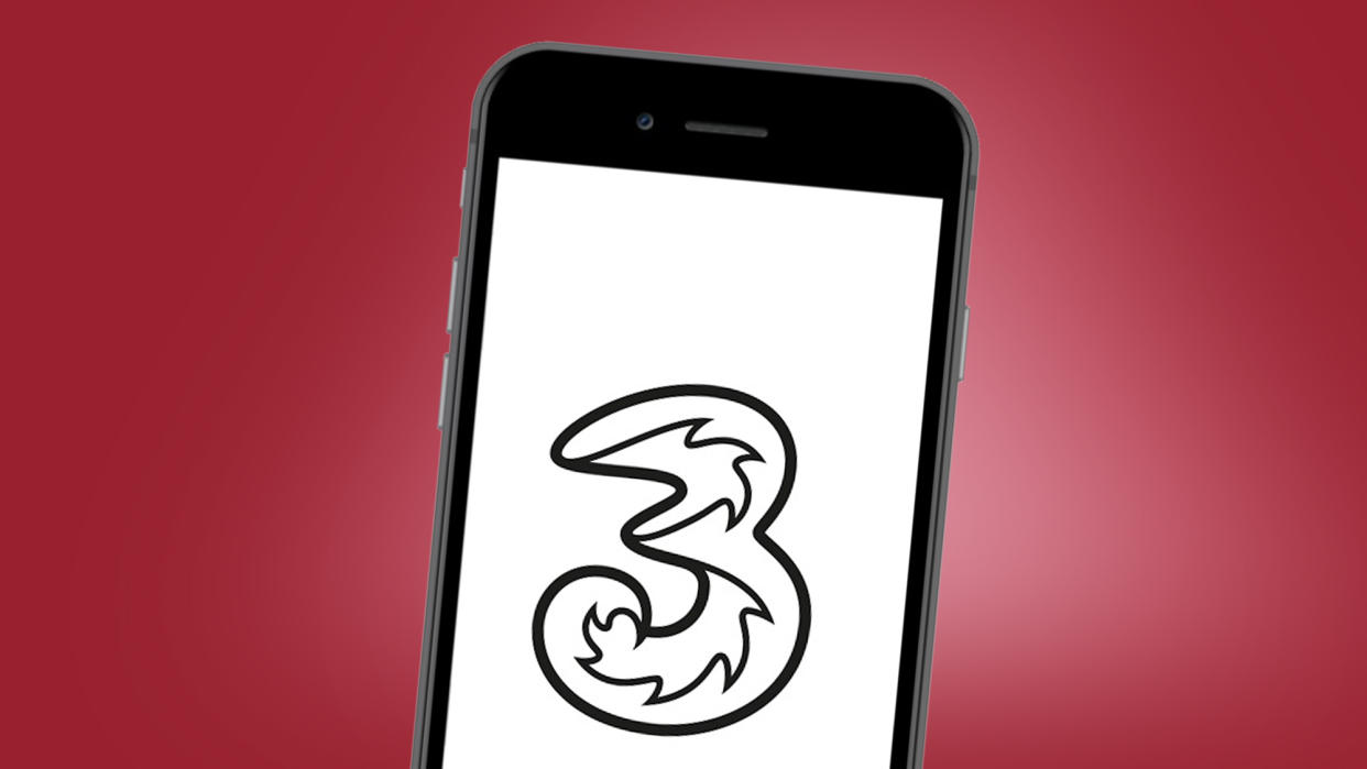  A phone on a red background showing the Three logo. 
