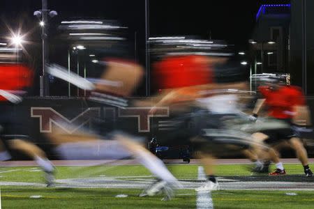 Massachusetts Institute of Technology (MIT) Engineers football players attend practice in Cambridge, Massachusetts November 13, 2014. REUTERS/Brian Snyder