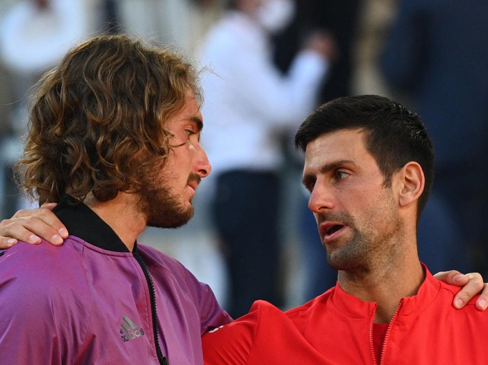Novak Djokovic (right) consoles Stefanos Tsitsipas after the French Open final (AFP via Getty Images)