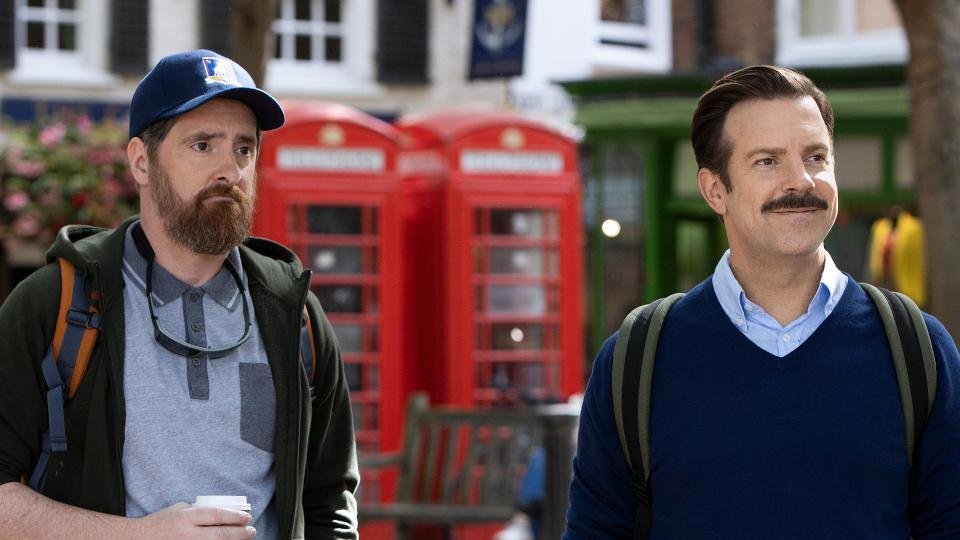 Brendan Hunt (left) and Jason Sudeikis in their roles as Coach Beard and Ted Lasso in the Apple TV+ series "Ted Lasso," which returns for its third season after a 17-month gap.