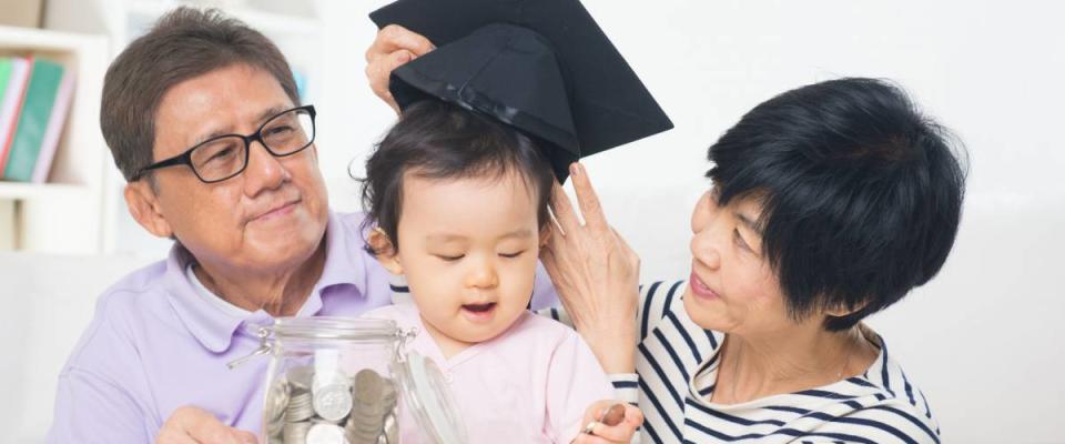 asian grand parents with grand daugther education saving concepts