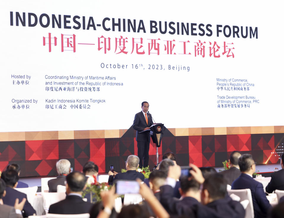 In this photo released by Xinhua News Agency, Indonesian President Joko Widodo delivers a speech at a China-Indonesia business forum in Beijing on Oct. 16, 2023. In Southeast Asia, one of the most prominent BRI projects has been the construction of a high-speed 142-kilometer (88.23 mile) railway line linking Indonesia's capital, Jakarta, to the economic hub of Bandung. Widodo inaugurated the $7.3 billion China-funded project earlier this month. (Ding Haitao/Xinhua via AP)