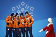 Medals Ceremony - Short Track Speed Skating Events - Pyeongchang 2018 Winter Olympics - Women's 3000 m - Medals Plaza - Pyeongchang, South Korea - February 21, 2018 - Bronze medalists Suzanne Schulting, Yara Van Kerkhof, Lara van Ruijven, Jorien ter Mors of the Netherlands on the podium. REUTERS/Kim Hong-Ji