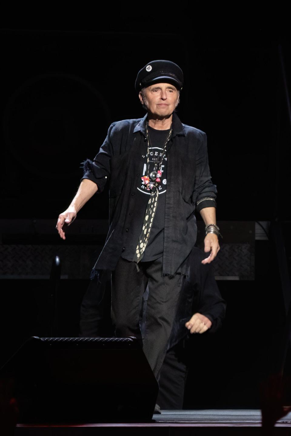 Nils Lofgren arrives onstage during the Bruce Springsteen and The E Street Band 2023 tour at the Moody Center on Feb. 16 in Austin, Texas.