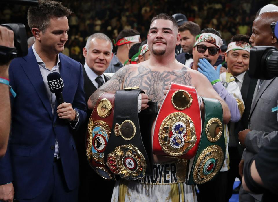 Andy Ruiz poses for photographs after a heavyweight title boxing match against Anthony Joshua on Saturday, June 1, 2019, in New York. Ruiz won in the seventh round. (AP Photo/Frank Franklin II)