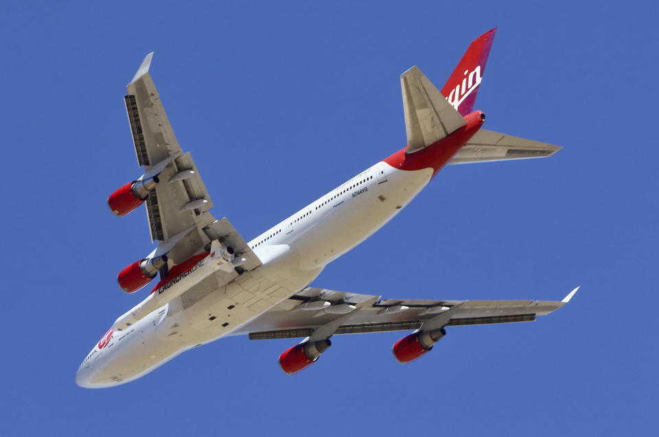 Virgin Orbit Boeing 747-400 rocket launch platform, named Cosmic Girl, takes off from Mojave Air and Space Port, Mojave (MHV) on its second orbital launch demonstration in the Mojave Desert, north of Los Angeles. (AP Photo/Matt Hartman)