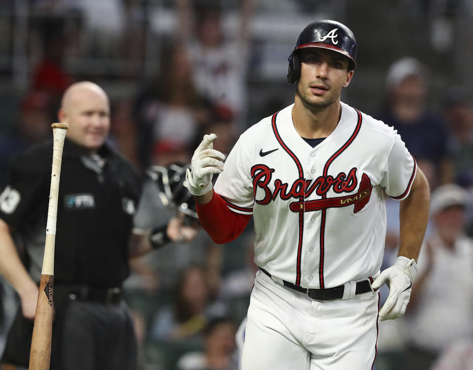 Atlanta Braves first baseman Matt Olson tosses his bat hitting a 2-RBI home run to take a 3-0 lead over the New York Mets during the fourth inning in a MLB baseball game on Tuesday, Aug. 16, 2022, in Atlanta. (Curtis Compton/Atlanta Journal-Constitution via AP)