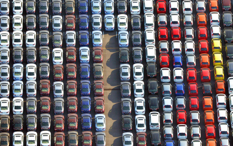 In this Jan. 2017 photo, cars are parked waiting to be exported at Yokohama port near Tokyo. Japan’s Trade Minister Hiroshige Seko criticized President Donald Trump’s tariff policies as based on a serious misunderstanding about the importance of free trade and the contributions of Japanese companies to the U.S. economy. (Kyodo News via AP)
