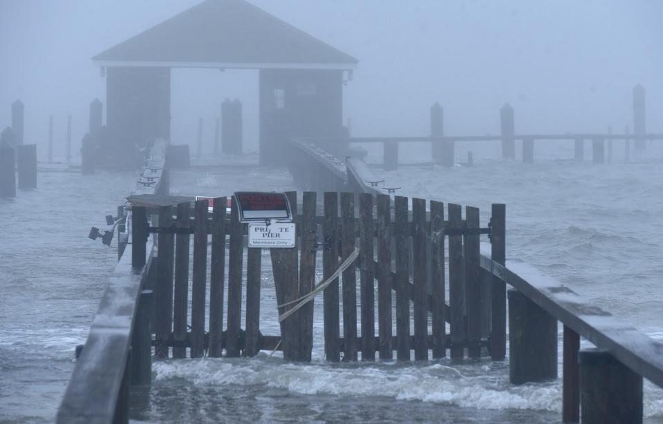 HYANNISPORT 01/13/24 The Hyannisport Yacht Club's pier takes a beating at high tide from storm waters pushed in by strong southerly winds. 
Steve Heaslip/Cape Cod Times