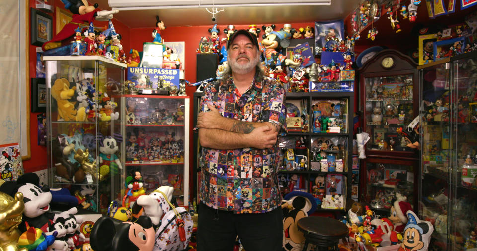 Paul Bottos with his Mickey Mouse collection. (Photo: Yahoo Lifestyle)