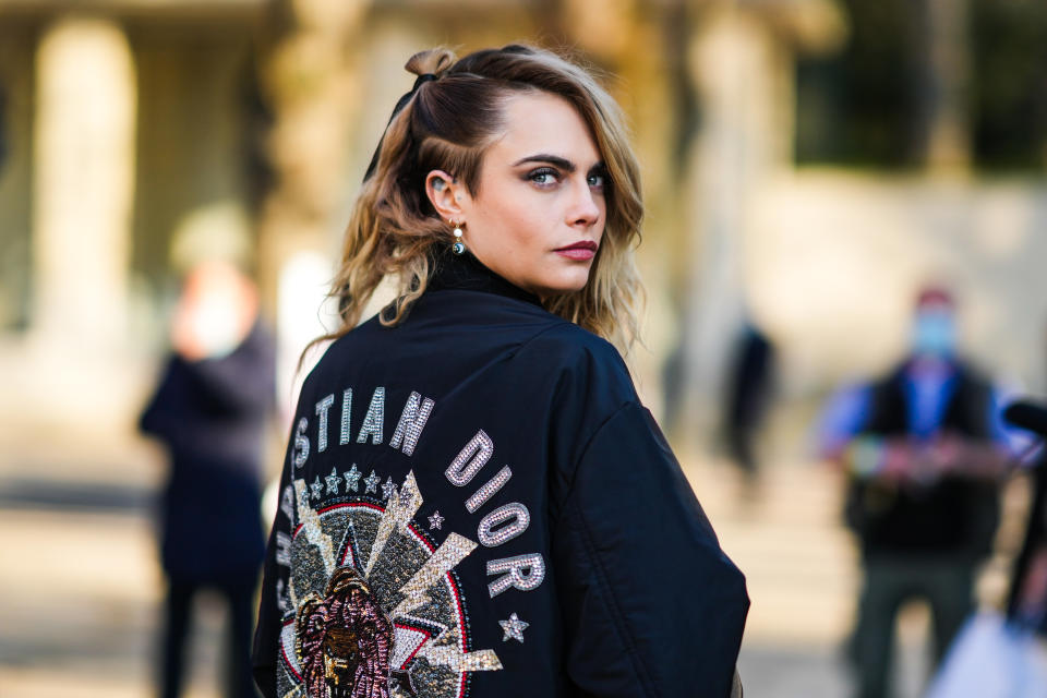 Cara Delevingne reflects on being an LGBTQ role model and advocate. (Photo: Getty Images)