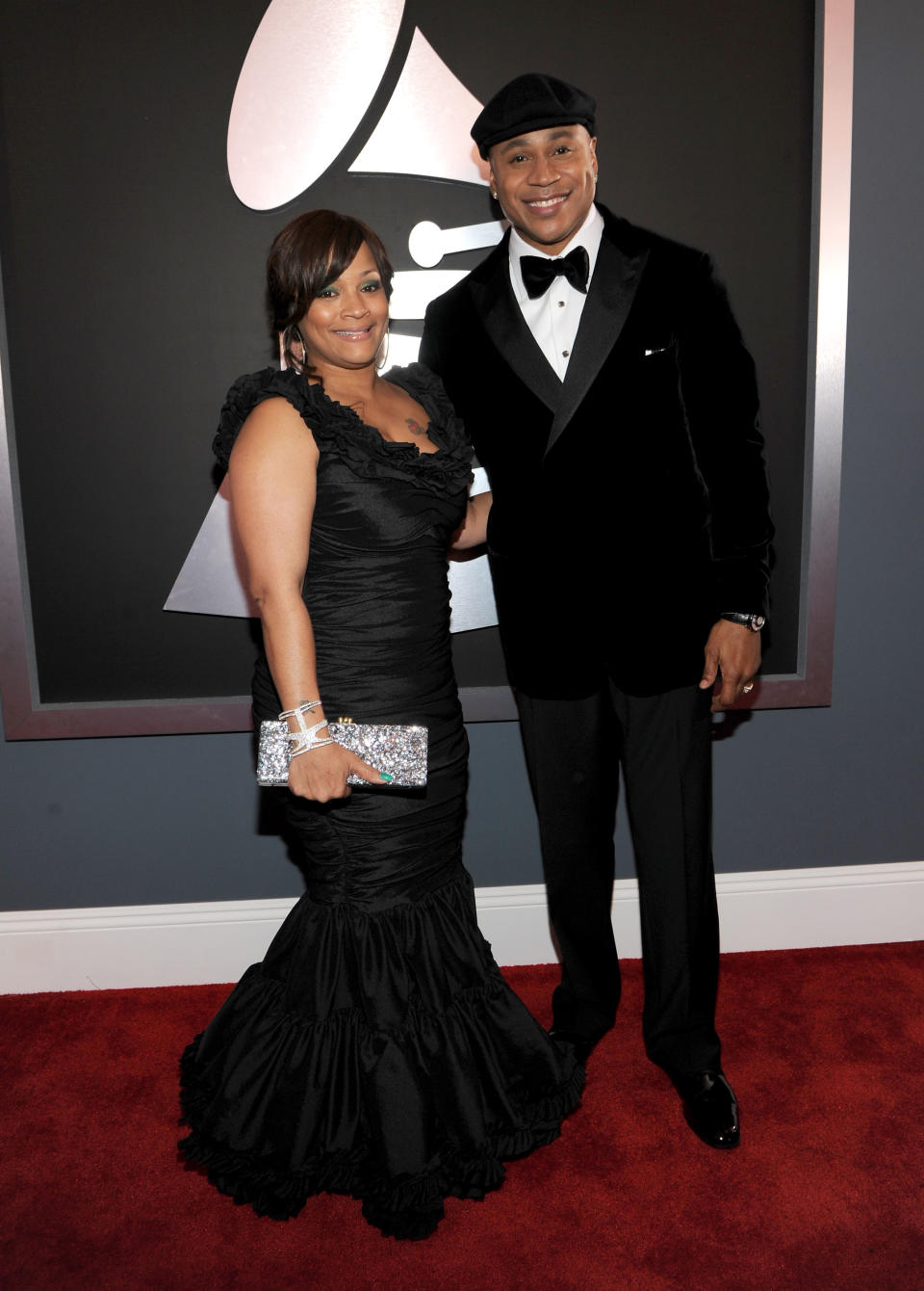 LOS ANGELES, CA - FEBRUARY 12: Rapper LL Cool J (R) and Simone Johnson arrive at the 54th Annual GRAMMY Awards held at Staples Center on February 12, 2012 in Los Angeles, California. (Photo by Larry Busacca/Getty Images For The Recording Academy)