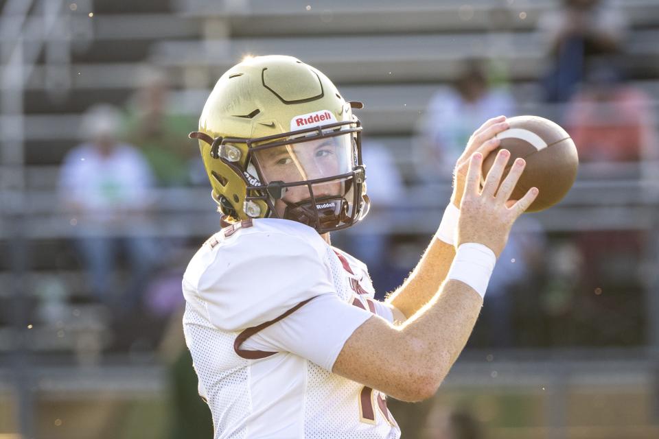 Indianapolis Lutheran High School junior Jackson Willis (10) warms up on the field before the start of an IHSAA varsity football game against Monrovia High School, Friday, Sept. 29, 2023, at Monrovia High School.