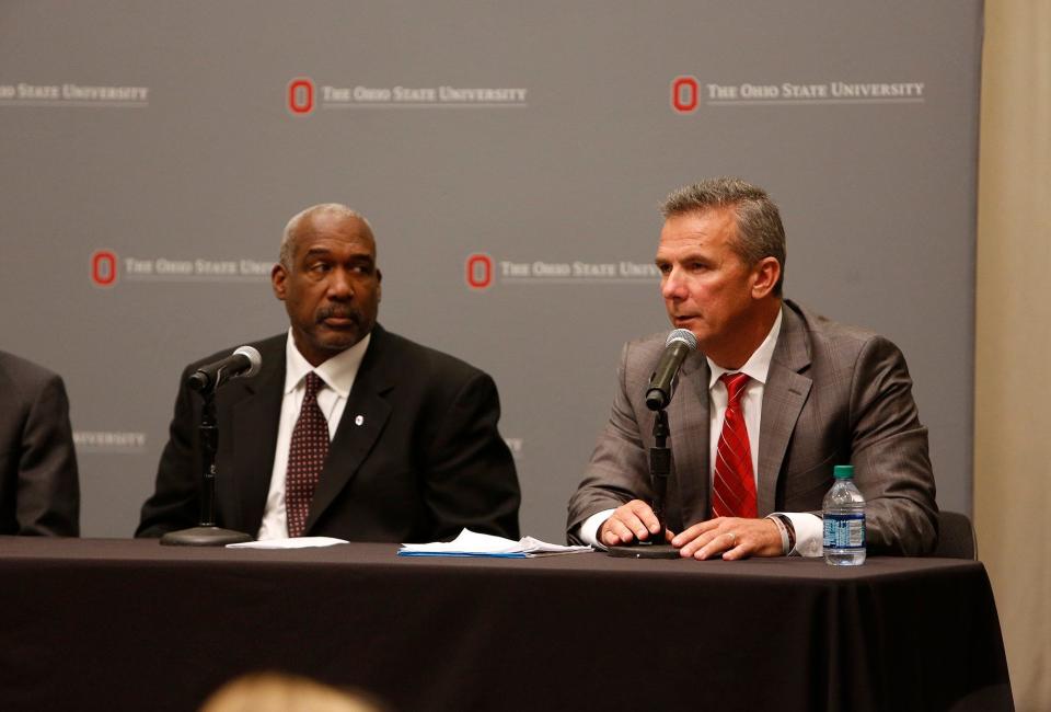 Ohio State football coach Urban Meyer and athletic director Gene Smith speak at a press conference on Aug. 22, 2018 to announce the punishments of Meyer and Smith for the handling of assistant coach Zach Smith's domestic situation.