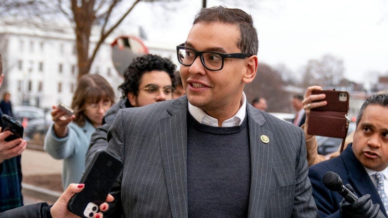 Rep. George Santos, R-N.Y., leaves a House GOP conference meeting on Capitol Hill, in Washington.