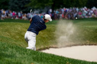 Rory McIlroy, of Northern Ireland, shoots out of the bunker on the fourth hole during the second round of the Travelers Championship golf tournament at TPC River Highlands, Friday, June 24, 2022, in Cromwell, Conn. (AP Photo/Seth Wenig)