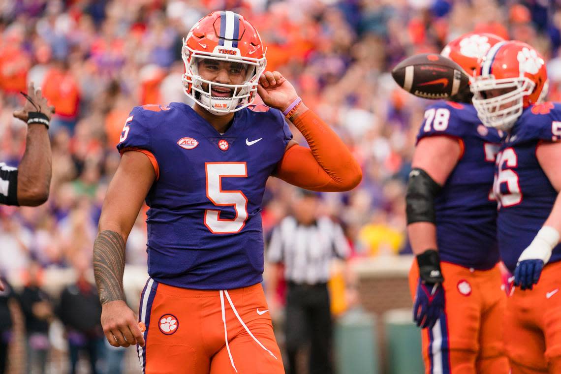 Clemson quarterback DJ Uiagalelei (5) reacts after scoring a touchdown in the first half of an NCAA college football game against Louisville on Saturday, Nov. 12, 2022, in Clemson, S.C.