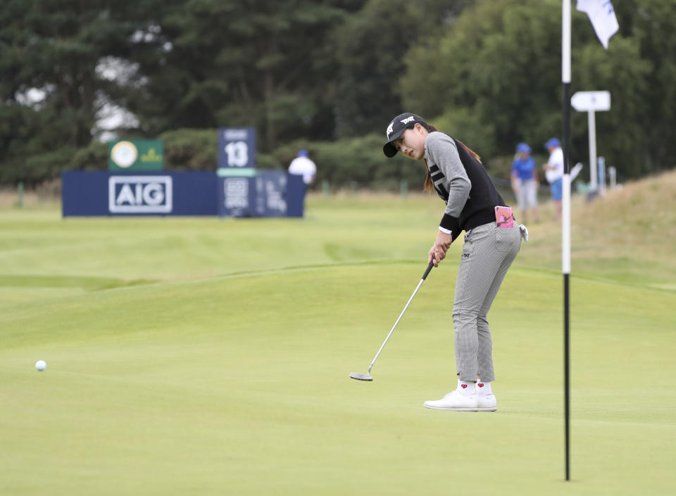 United States' Jennifer Song putt on the 13th green during the second round of the Women's British Open golf championship, in Carnoustie, Scotland, Friday, Aug. 20, 2021. (AP Photo/Scott Heppell)