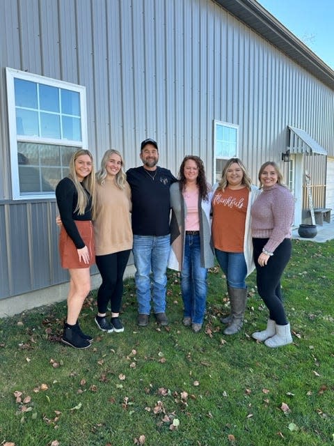 Craig and Jennifer Malterer recently opened C&J Appliance Repair Service in Port Washington. They are shown with their daughters, from left, Abby Morrison, Lindsay Malterer, Hannah Morrison, and Lauren Malterer.