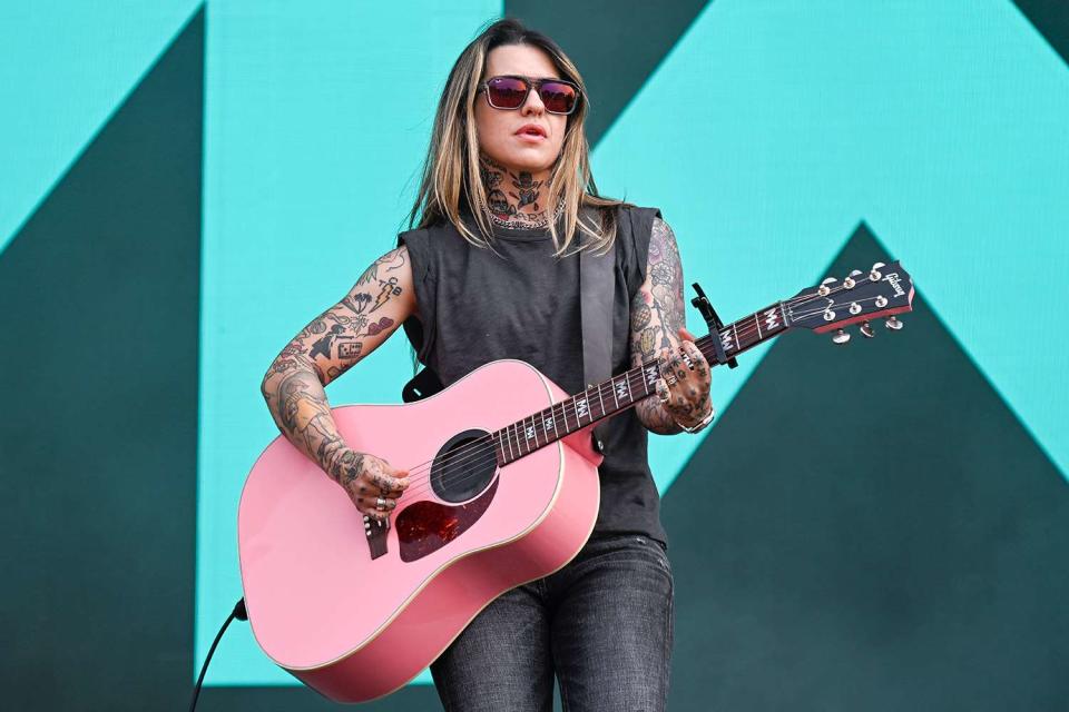 <p>Astrida Valigorsky/Getty </p> Morgan Wade performs at Bonnaroo on June 16, 2023