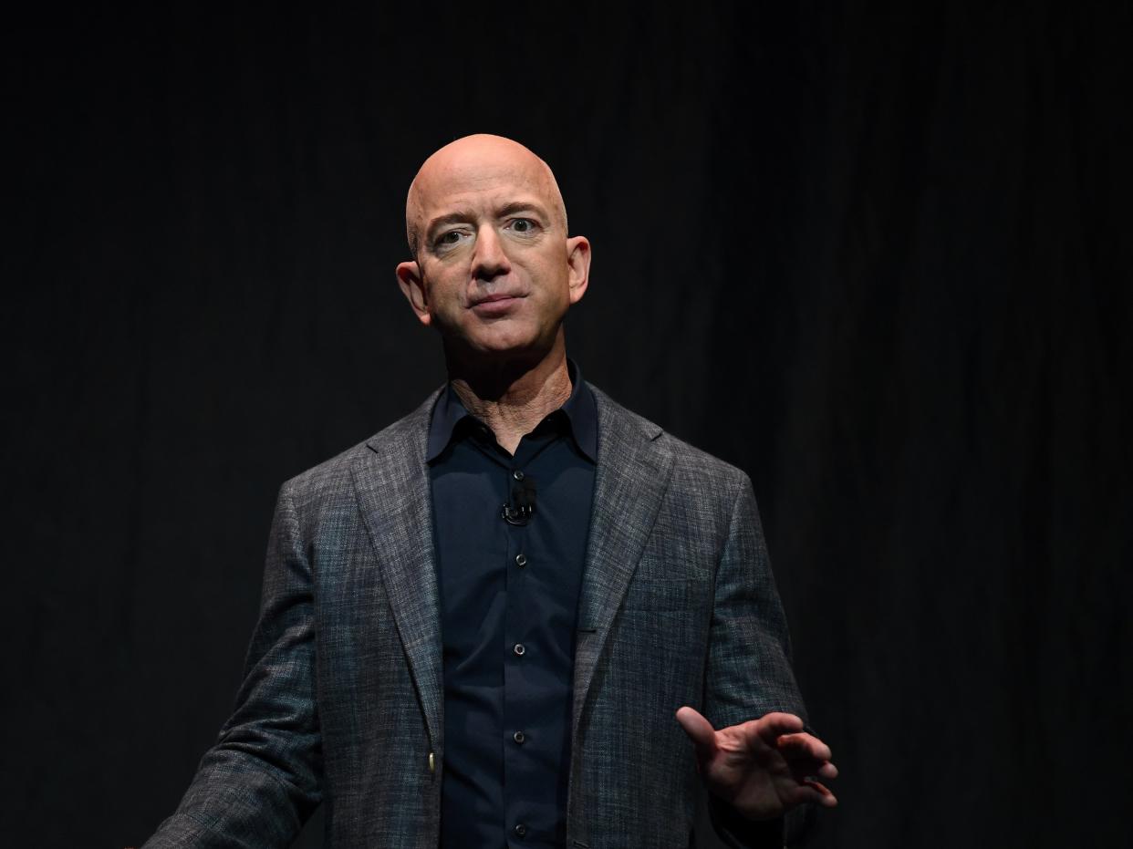 FILE PHOTO: Founder, Chairman, CEO and President of Amazon Jeff Bezos speaks during an event about Blue Origin's space exploration plans in Washington, U.S., May 9, 2019. REUTERS/Clodagh Kilcoyne/File Photo