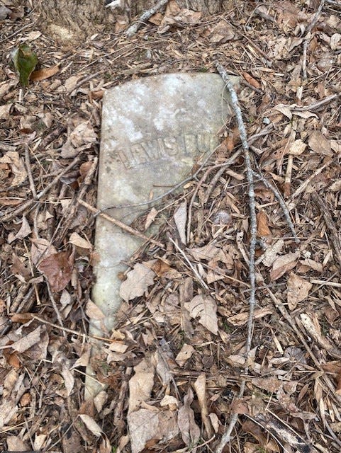 Hiker Andrew Grover snapped a photograph of this headstone after rediscovering a historical cemetery in Cranston. He believes it marks the grave of Lewis Burlingame.