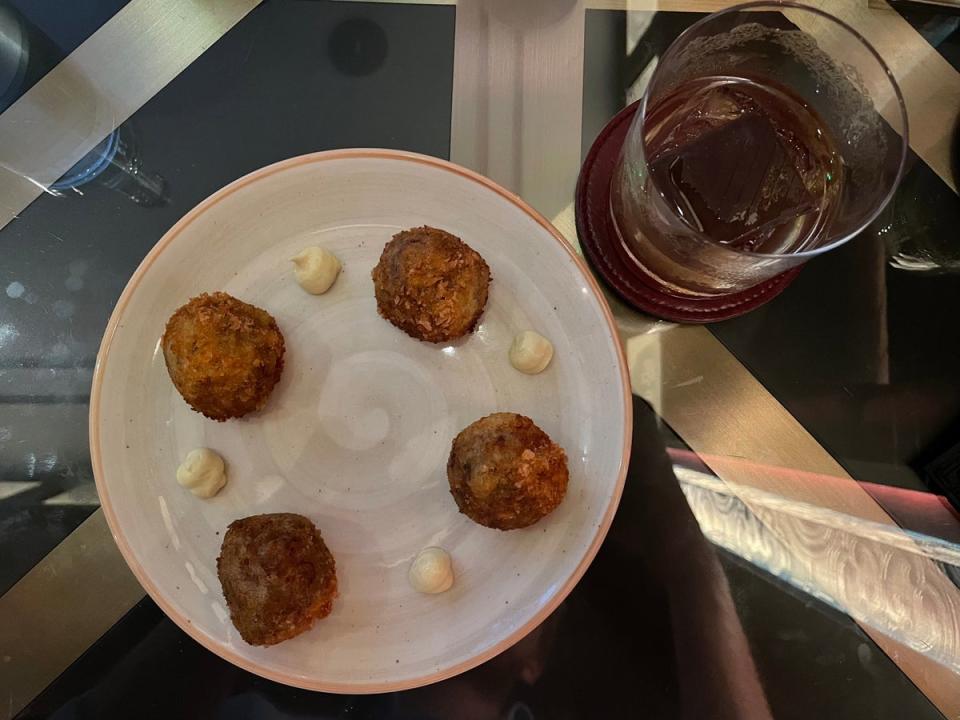 The bar snacks menu, featuring truffle arancini, sets the bar high (Sean Russell)